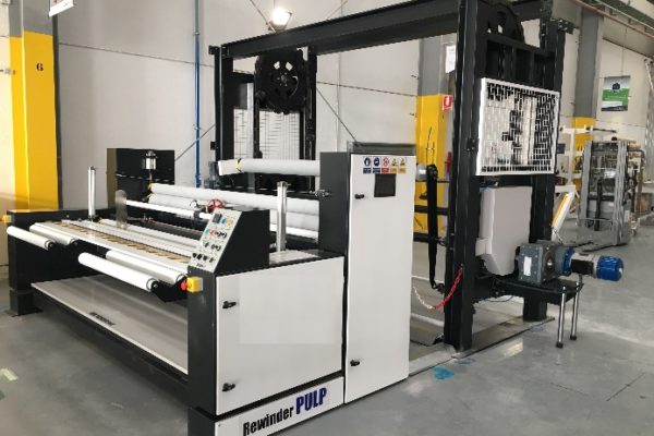 automatizacion de maquinaria en barcelona atelma maquina de enrolla con noria porta tejidos